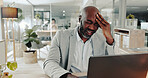 Headache, laptop and stress with business black man at desk in office for audit or tax deadline. Burnout, computer and mistake with error or fail of professional employee in workplace for reporting