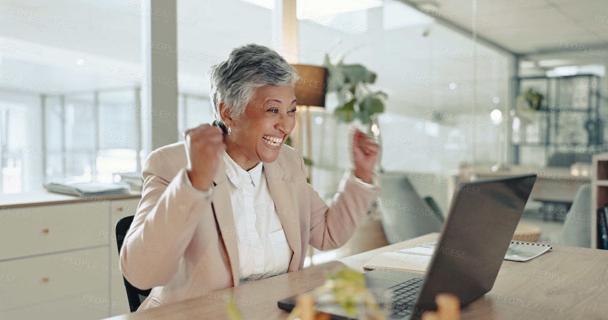 Buy stock photo Celebration, mature woman and notification on laptop, alert and happy with feedback and achievement. Office, shocked and person with laptop, winner and accountant in company, funding and excited