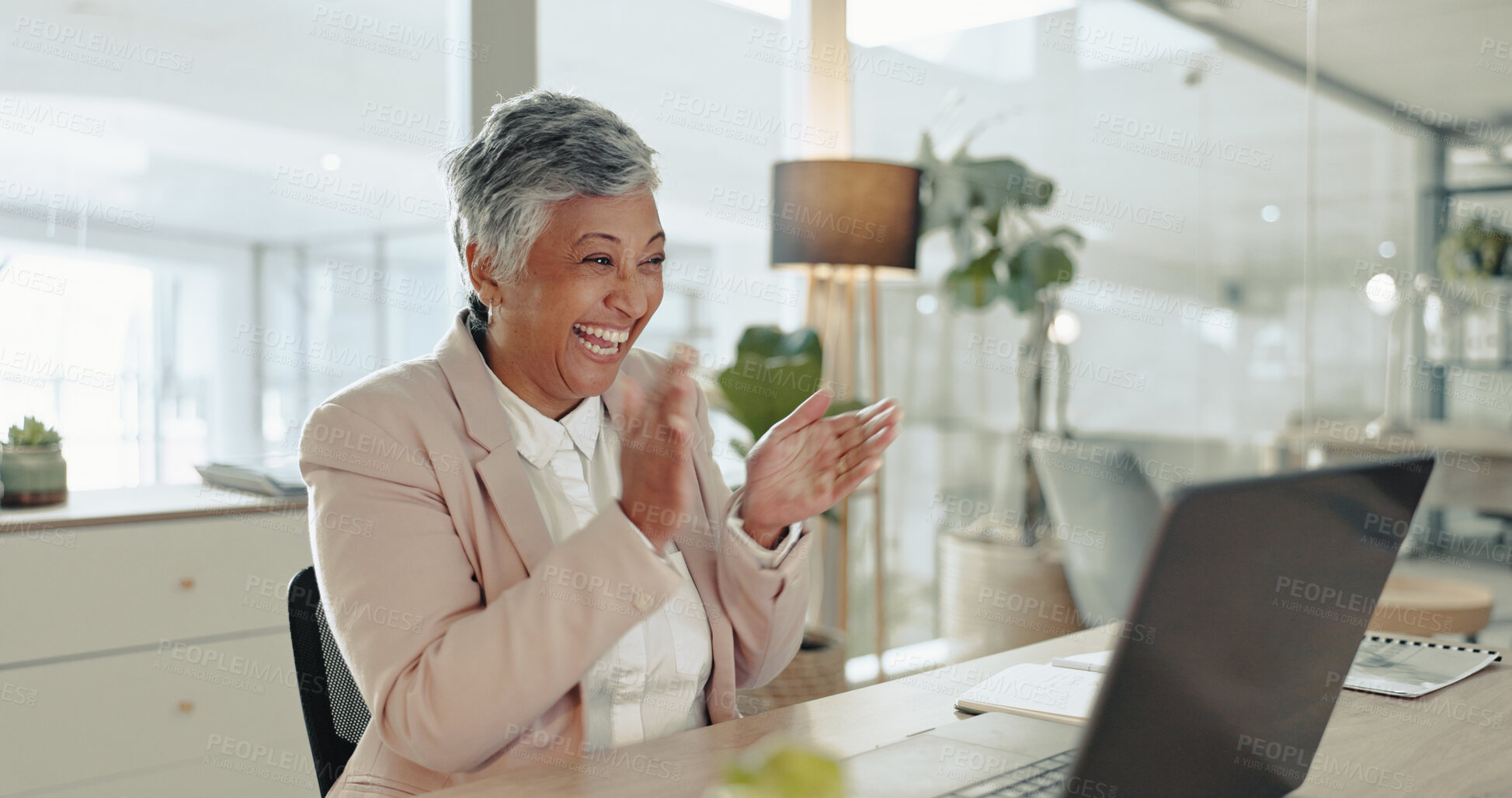 Buy stock photo Celebration, clapping and mature woman with laptop, smile and happy with feedback and achievement. Office, laughing and person with alert, winner and investor in company, joy and excited for funding