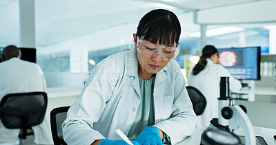 Buy stock photo Scientist, woman and writing for research, notes and experiment results or medical information. Notebook, update and laboratory technician with documents for virus development or pathology test