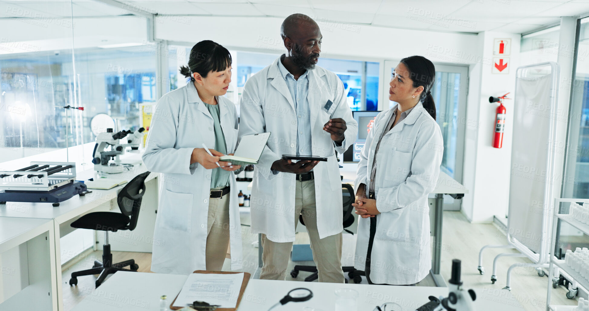 Buy stock photo Scientist, team and discussion for research, notes and experiment results or medical information. People, notebook and laboratory technician with documents for virus development or pathology test