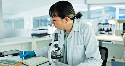 Buy stock photo Scientist, woman and writing for microscope, notes and experiment results or medical information. Notebook, update and laboratory technician with research for virus development or pathology test