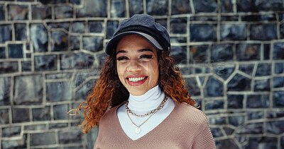 Buy stock photo Portrait, fashion and woman with smile, outdoor and confidence with pride, trendy clothes and wall background. Face, person and girl with stylish outfit, travel and tourism with commute and happiness