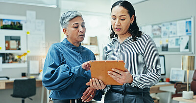 Buy stock photo Architects, women and tablet discussion with agency, planning and meeting for creative partnership. Mentor, employee and engineering for blueprint, brainstorming or problem solving for startup office