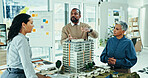 Business people, architect or team with 3D model for construction, industrial development or project structure at office. Group, employee or interior designers with prototype for meeting at workplace