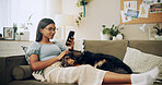 Search, dog and phone with woman on sofa for bonding, social media post and pet adoption. Happiness, scroll and animal rescue with person in living room at home for foster care, relax and online app