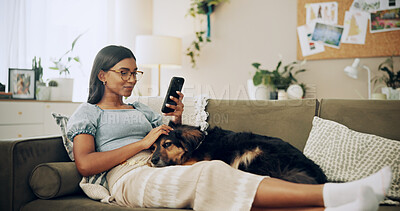 Buy stock photo Search, dog and phone with woman on sofa for bonding, social media post and pet adoption. Happiness, scroll and animal rescue with person in living room at home for foster care, relax and online app