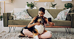 Hug, love and woman with dog, selfie and bonding together with best friend in living room. Apartment, person and girl on carpet, embrace and profile picture with service animal, house and companion