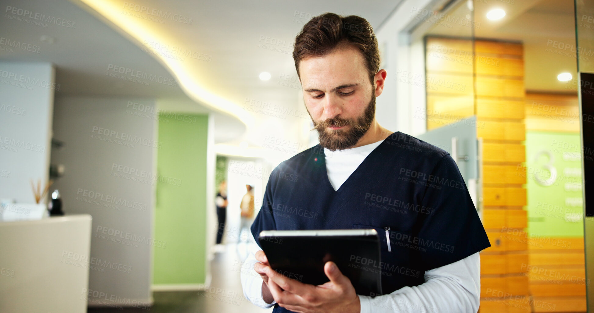 Buy stock photo Clinic, dentist and man with tablet for medical service, appointment schedule and research. Healthcare, hospital and person on digital tech with results for consultation, oral care and dental hygiene