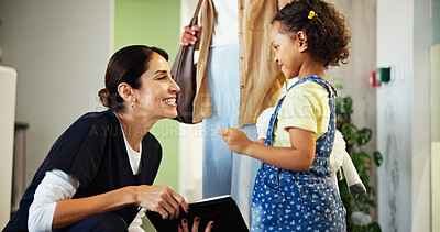 Buy stock photo Dentist, tablet and child in waiting room of clinic for consultation, appointment and medical service. Healthcare, happy and woman with girl for teeth cleaning, oral care and dental hygiene in lobby