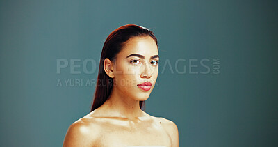 Buy stock photo Portrait, skincare and confident woman with beauty, glow and natural aesthetic on studio background space. Face, serious and model in makeup cosmetics for dermatology, shine and spa facial treatment