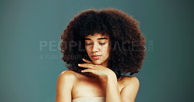 Buy stock photo Beauty, growth or woman with afro hair care, studio and treatment for wellness or health. Proud, shampoo or confident girl model with face, volume or natural texture on green background in Brazil