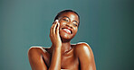 Black woman, eyes closed and smile for skincare in studio background with pride or satisfied for results. Female person, beauty and glow with confidence for body care and skin treatment routine