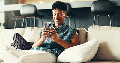 Buy stock photo House, relax and man on sofa, cellphone and typing with social media, texting and smile. Apartment, person and guy on couch, smartphone or message to contact, digital app or online reading in lounge
