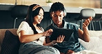 Happy couple, tablet and streaming as funny post on social media, online and watching video. Female person, man and chat with technology in home as bonding, relax or together on couch in conversation