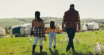 Buy stock photo Back, holding hands and family with agriculture, farm and bonding together with sustainability. Parents, outdoor and mother with father, girl and child with nature, environment and countryside