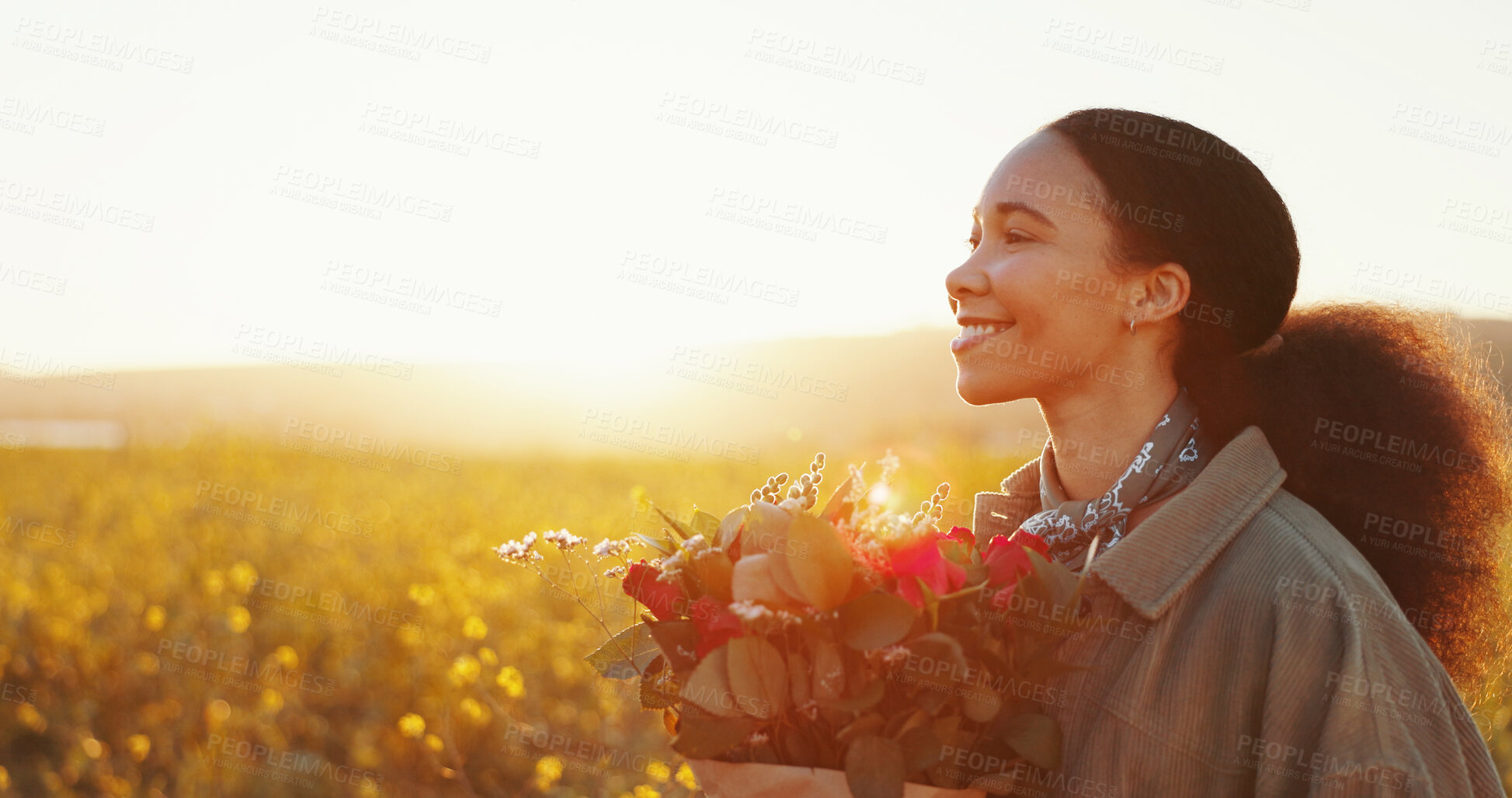 Buy stock photo Countryside, bouquet and woman with flowers, thinking and field with lens flare, happiness and sunset. Person, outdoor and girl with environment, gratitude for present and gift with freedom or nature