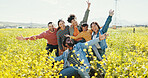 Family, friends and child in park together for summer holiday, travel or vacation celebration. Bonding, love or portrait and group of happy people outdoor in field of yellow flowers for getaway