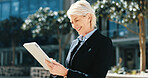 Tablet, communication and mature businesswoman in city for email, connectivity or networking. Digital technology, research and female executive CEO with online contact for corporate deal in town.