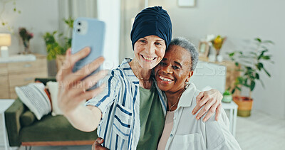 Buy stock photo Senior, happy women and hug with selfie for photography, picture or memory together in retirement at old age home. Elderly, female people or friends with smile or embrace for capture moment at house