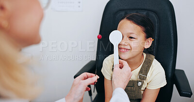 Buy stock photo Doctor, cover or child in eye test at optometry clinic for eyewear, health or sight wellness. Tools, occluder or happy kid in assessment for optical diagnosis, vision exam or consultation with object