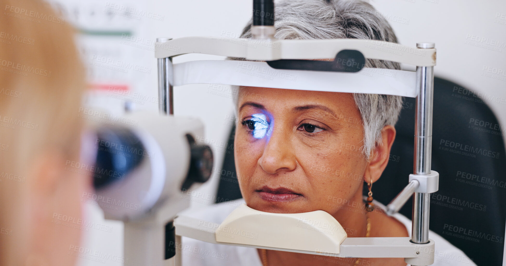 Buy stock photo Eye exam, consulting and light with old woman in clinic for optometrist, healthcare and vision. Medical, ophthalmologist and slit lamp with people and equipment for retina, test and assessment