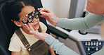 Trial frame, hands or girl in eye test at optometry clinic for eyewear, retina health or sight wellness. Vision exam, doctor or female child in assessment for optical lenses, frames or spectacles