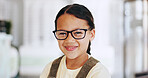 Eye care, girl child and portrait with glasses in optometry store for prescription lens, optic correction or healthcare. Vision, kid or happy with new eyewear for medical service or health insurance