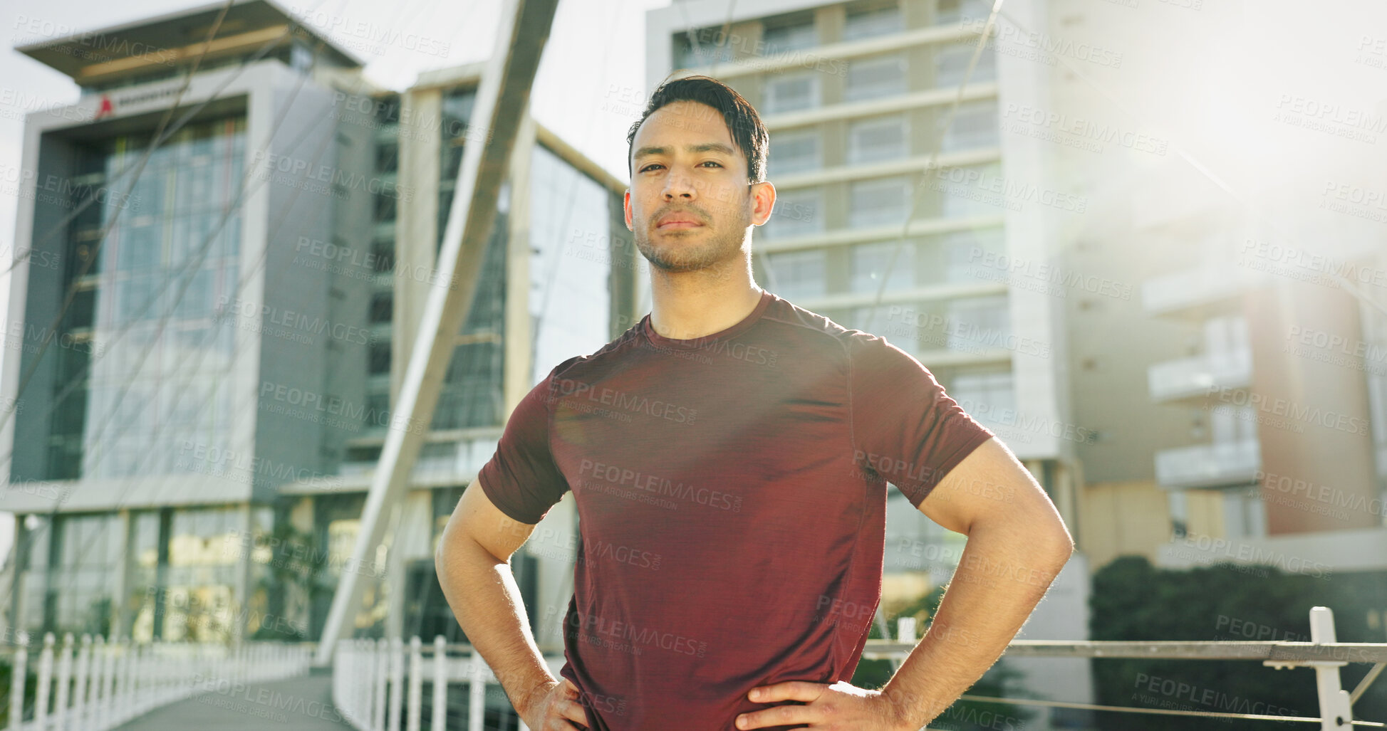 Buy stock photo Portrait, fitness and man in city, runner and urban town with buildings, lens flare and exercise. Face, healthy athlete and person in street, pride and wellness with workout and training confidence