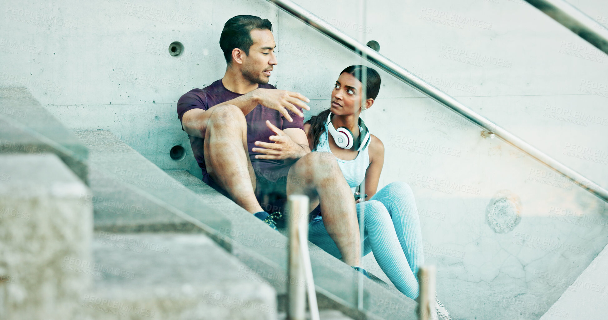 Buy stock photo Stairs, city and couple with talk, exercise break and smile for support or challenge in New York. Athlete, man and woman in urban town with health, fitness or training for marathon and endurance