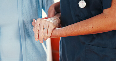 Buy stock photo Holding hands, support and medical nurse with old person for healthcare, caregiver and empathy. Retirement, walking and elderly care with closeup of people in nursing home for trust and help