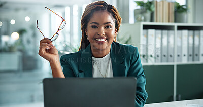 Buy stock photo Portrait, laptop and glasses with business woman in office for online, research or corporate governance specialist. Stakeholder email, crm manager and news with African person for report and smile