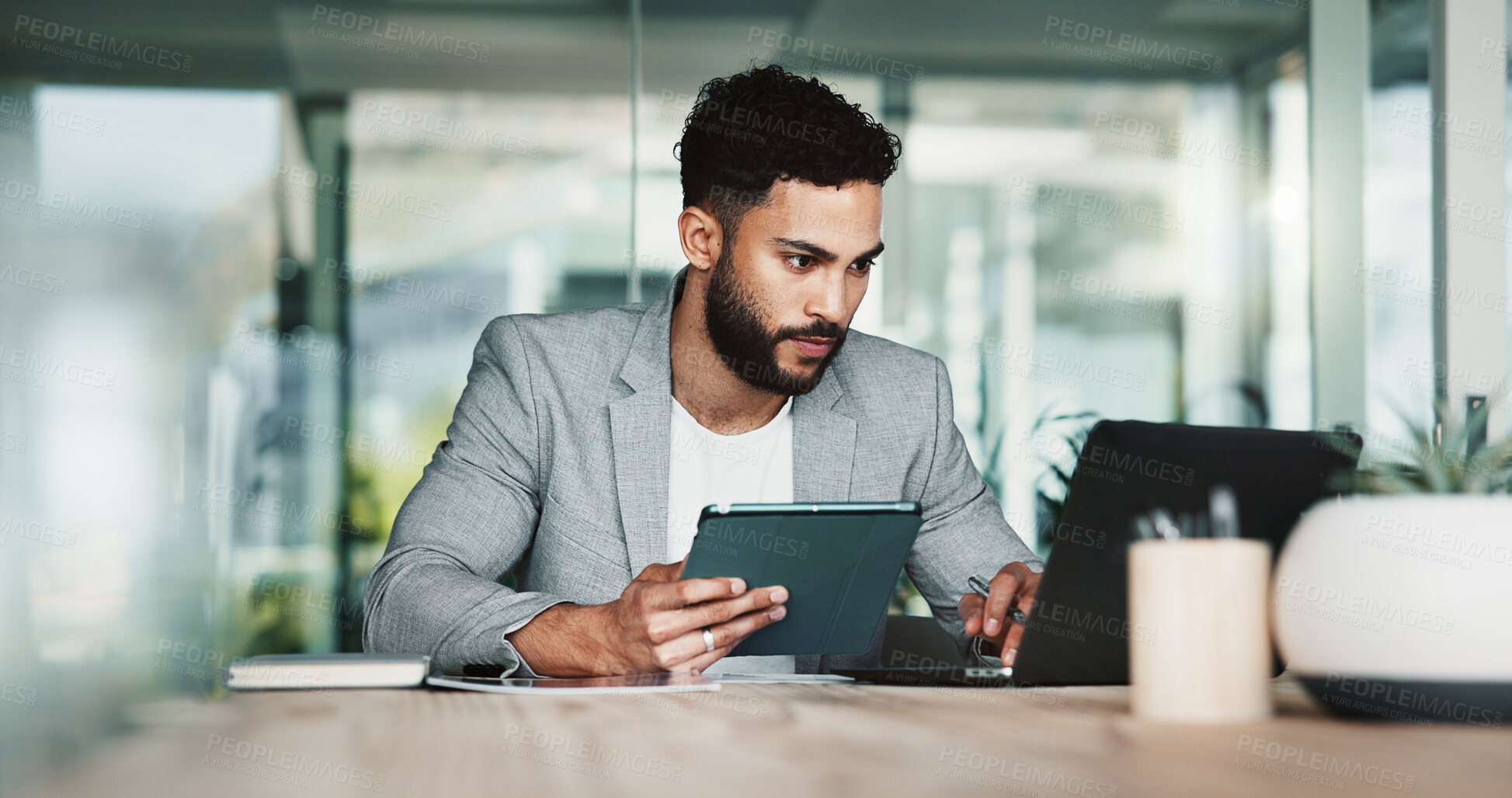 Buy stock photo Research, serious and man with laptop, office and investigative journalism for newsroom and online. Business, digital and person with info for story, reporter and professional for project and desk