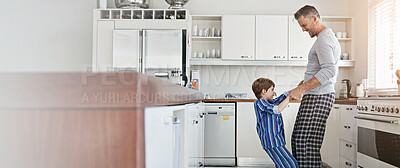 Buy stock photo Dance, happy and dad with child in kitchen for bonding, fun relationship and playful in morning. Family banner, dancer and father with son with music, learning and teaching moves together in home