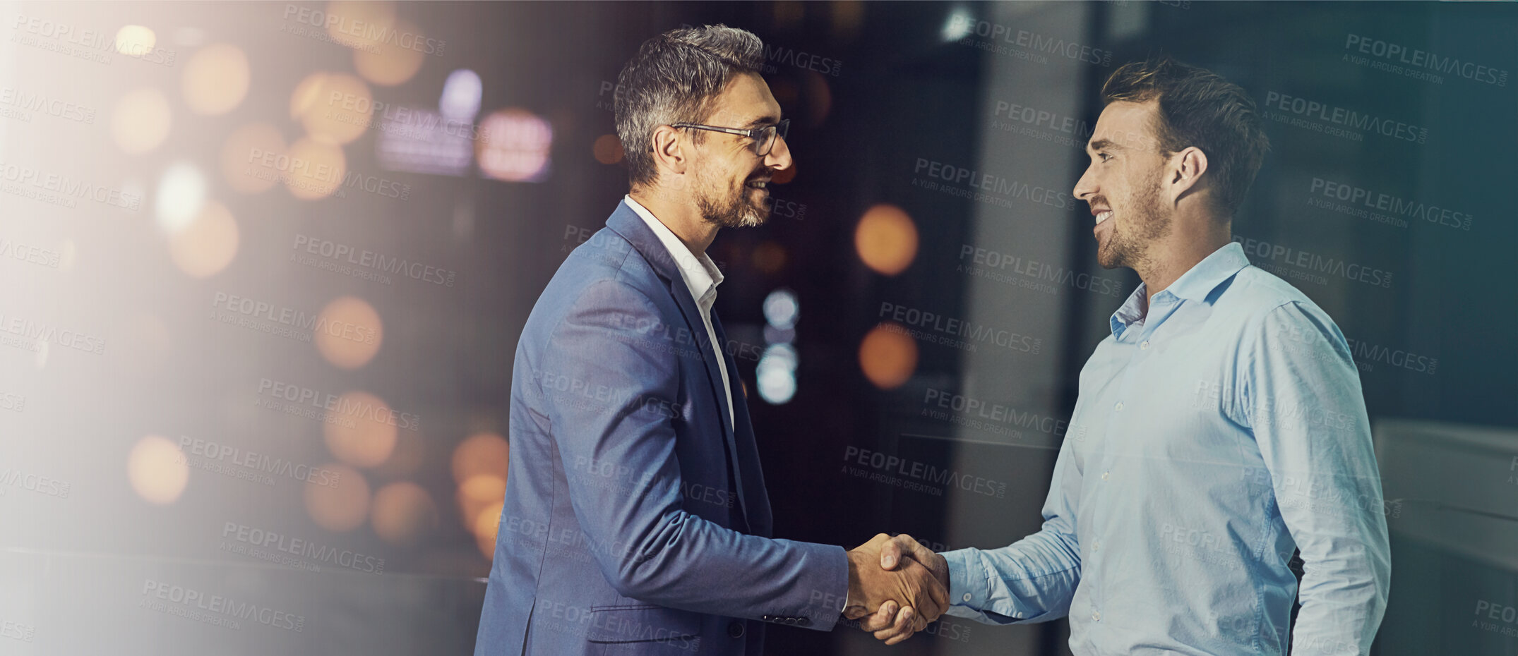 Buy stock photo Deal, handshake and partnership with employee men in office for meeting, thank you or welcome. Banner, bokeh and night with business people shaking hands for onboarding or recruitment on space