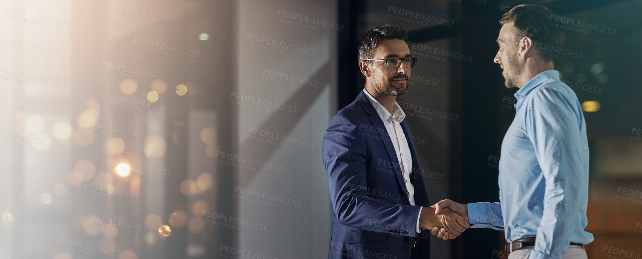 Buy stock photo Deal, handshake and partnership with business men in office for meeting, thank you or welcome. Banner, bokeh and mockup with employee people shaking hands for onboarding or recruitment on space