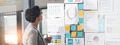 Buy stock photo Woman, sticky notes and office for thinking on research, problem solving and vision for campaign. Female person, contemplating statistics and glass wall for solution, brainstorming and mood board