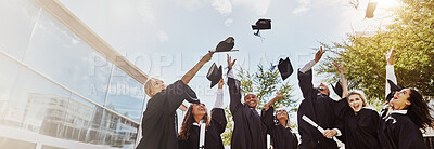 Buy stock photo Graduation, banner and success with students in college for diploma, scholarship and future. University degree, certificate and achievement with people in outdoor for learning, studying and low angle
