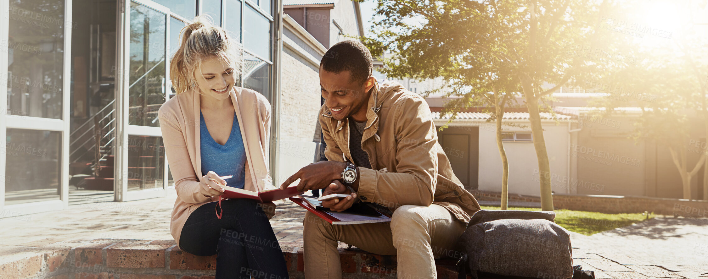 Buy stock photo Students, friends and reading book outside together on bench for class notes and exam study for education. University, gen z or people learning for scholarship, diversity and research for assignment