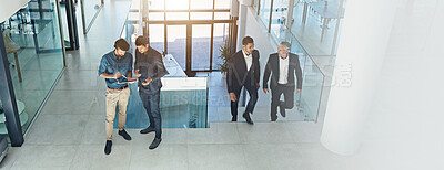 Buy stock photo Meeting, talking and men with tablet, business and colleagues with info for market research and online. Banner, above and collaboration for revenue of company, account manager and people in office