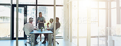 Buy stock photo Office, business people and woman with discussion in meeting, presentation and project review by flare. Teamwork, employees and manager with planning for corporate company, training and banner space