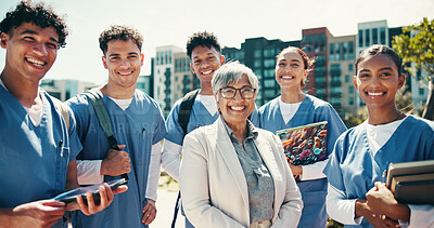 Buy stock photo Medical student, portrait and professor with people in outdoor for college, healthcare and teacher. Scholarship, university and doctors with intern group on hospital campus for smile and education