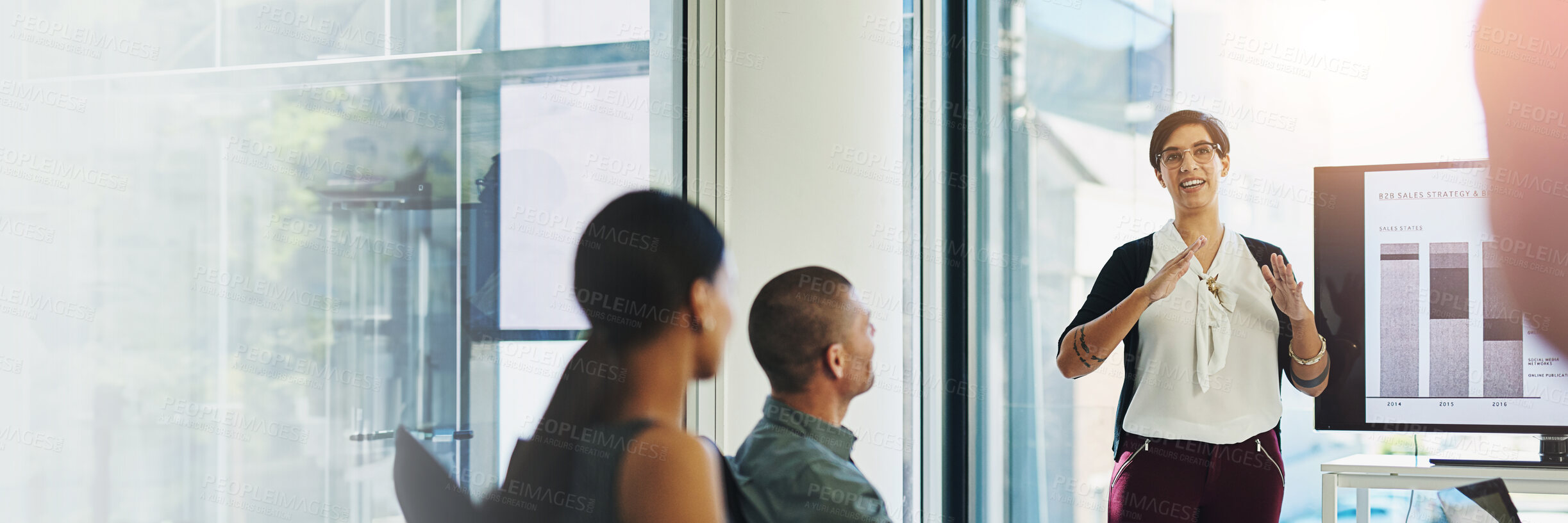 Buy stock photo Woman, smile and presentation with group in boardroom, advice and review for b2b sales strategy. Speaker, person and staff with brand communication, happy and discussion with team in modern office