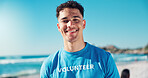 Volunteer, happy and portrait of man on beach for cleaning dirt, plastic and litter for ocean pollution. Community service, charity and person for environmental care, recycling and climate change