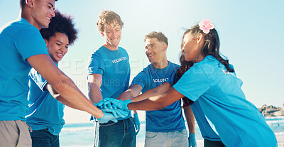 Buy stock photo Beach, volunteer and people with hands together for teamwork, support and community service. Climate change, recycling and friends in circle for ocean clean up, collaboration or social responsibility