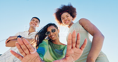 Buy stock photo Gen z friends, selfie and girl in low angle, blue sky and fashion with diversity for portrait in sunshine. Woman, group and hands for photography, memory and profile picture with smile in summer