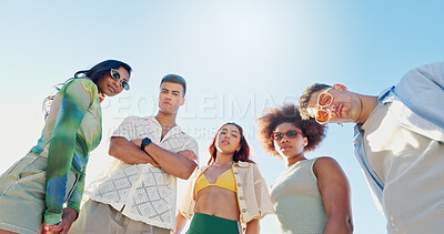 Buy stock photo Portrait, blue sky and group of people on beach with confidence, diversity or outdoor adventure holiday together. Friends, men and women with travel vacation, bonding and arms crossed on low angle