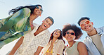 Portrait, sky and group of happy people on beach with confidence, diversity or outdoor adventure holiday together. Friends, men and women with travel vacation, fun bonding and smile with low angle