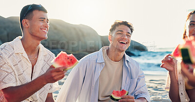 Buy stock photo Beach, picnic and group of happy people with watermelon, laughing and eating on tropical holiday together. Friends, men and women relax at ocean lunch with fruit, outdoor fun and humor on vacation