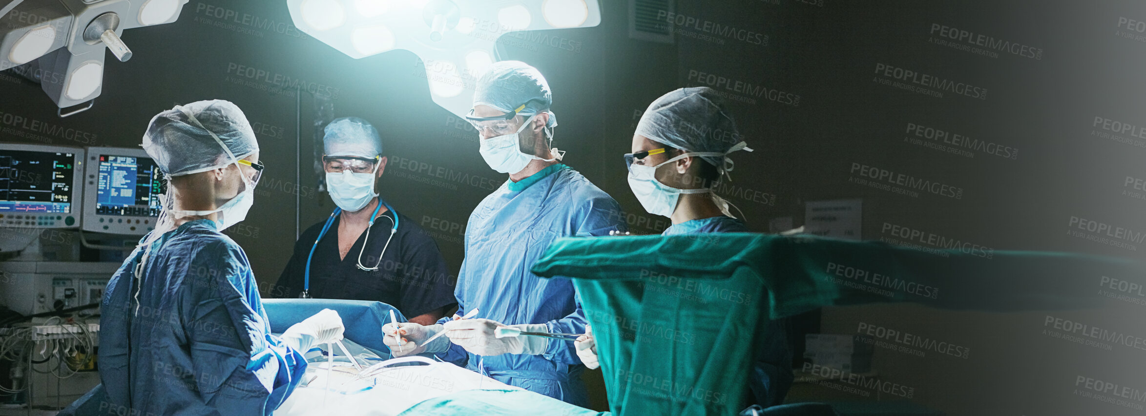 Buy stock photo Doctors, nurses and patient for surgery, collaboration and support for healthcare. Dark, hospital theater and people with teamwork, procedure and surgeons for cardiology and treatment in ICU clinic